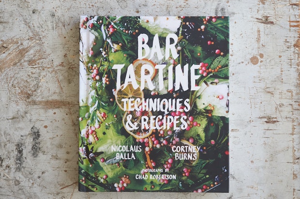 bar tartine cookbook on a bench