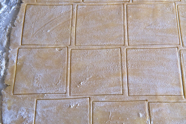 pie dough stamped into squares for hand pies