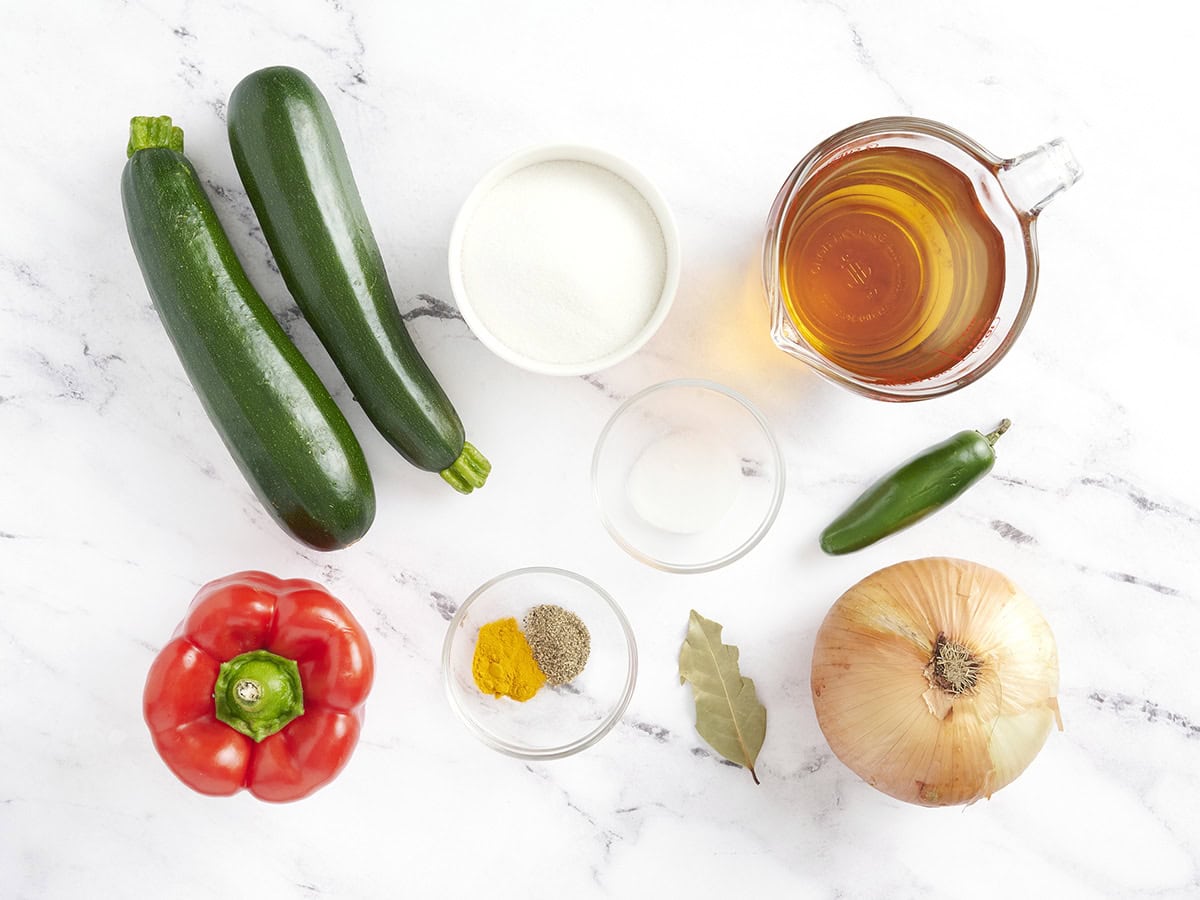 The ingredients to make zucchini relish.