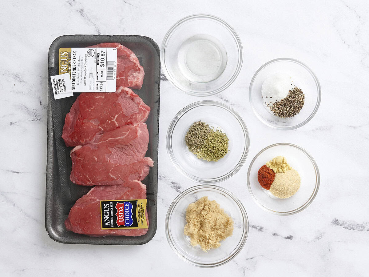 The ingredients to make grilled sirloin tender steaks.