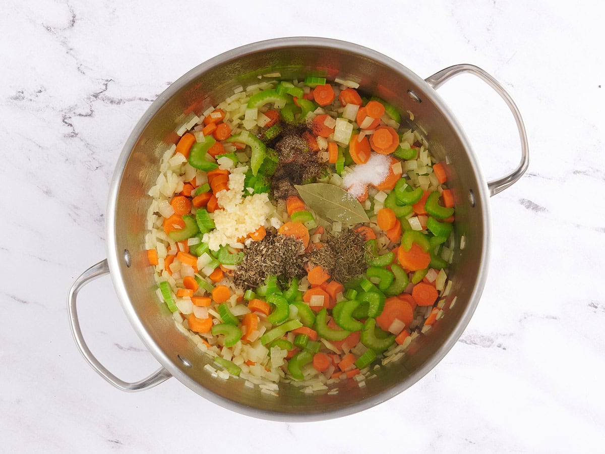 Dried seasonings added to a soup pot.