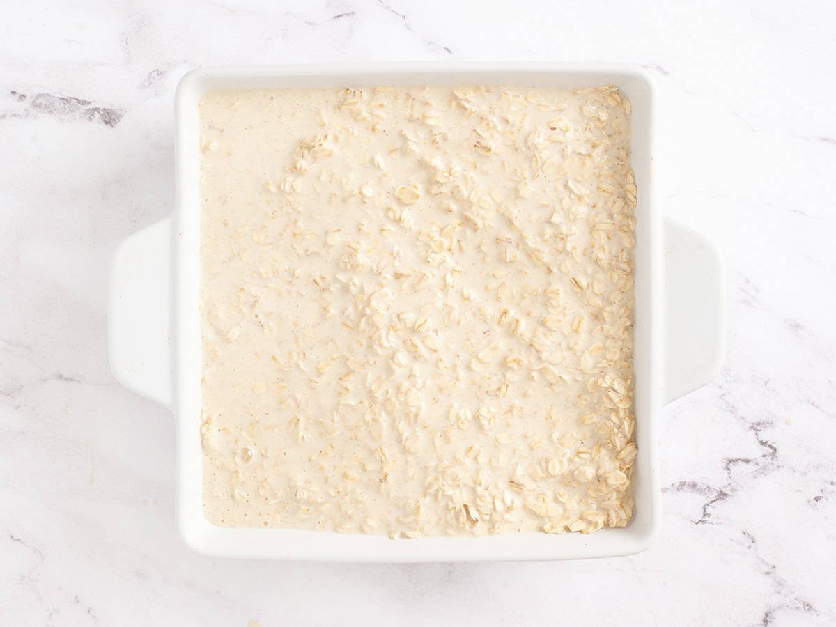 Oatmeal in a baking dish for baked oatmeal.
