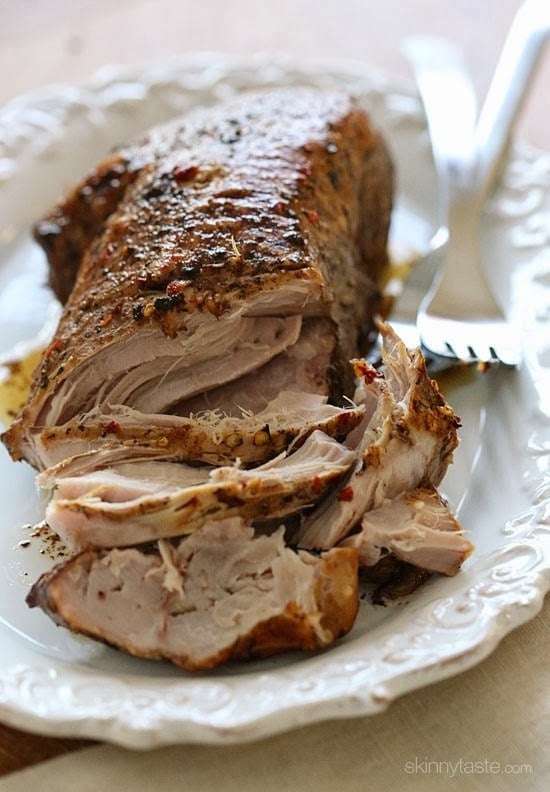 This Crock Pot Balsamic Pork Roast is so easy and literally falls apart once cooked. Here it's cooked with balsamic vinegar and honey which gives it a slight tang that I love!