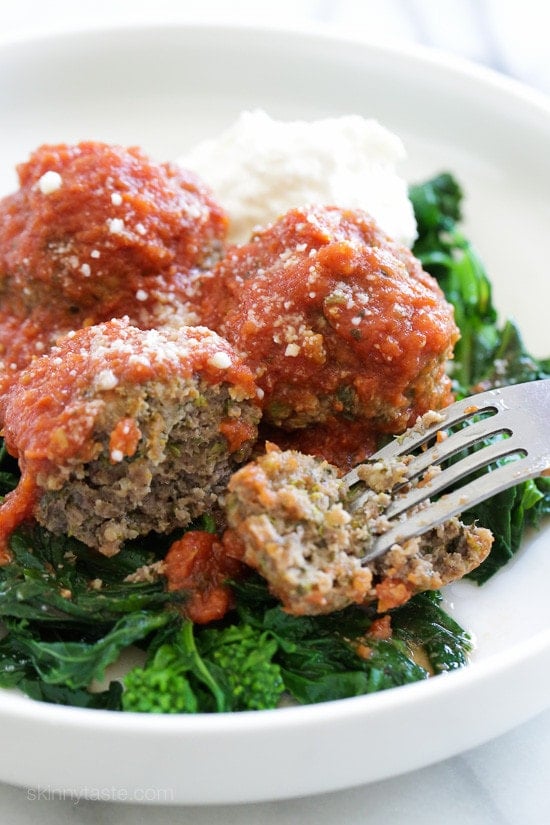 Oh my word, these slow cooker meatballs are SO good!! The slightly bold, earthy flavor of broccoli rabe pairs perfectly with salty cheeses, so I knew they would be awesome in my Sunday meatballs, and I was right!