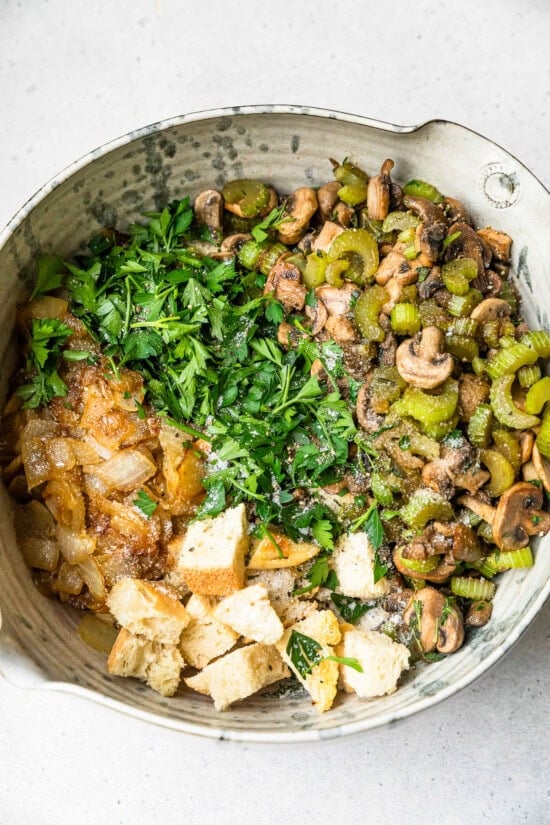 Add sourdough bread and fresh herbs