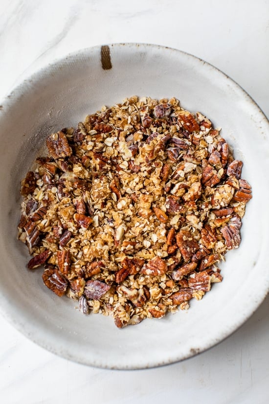 Praline nut and oat topping in bowl.