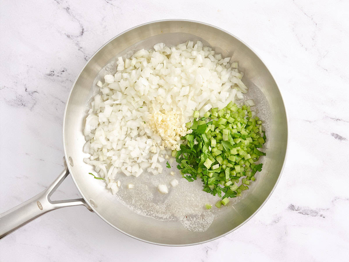 Onions, celery, garlic and butter in a skillet.