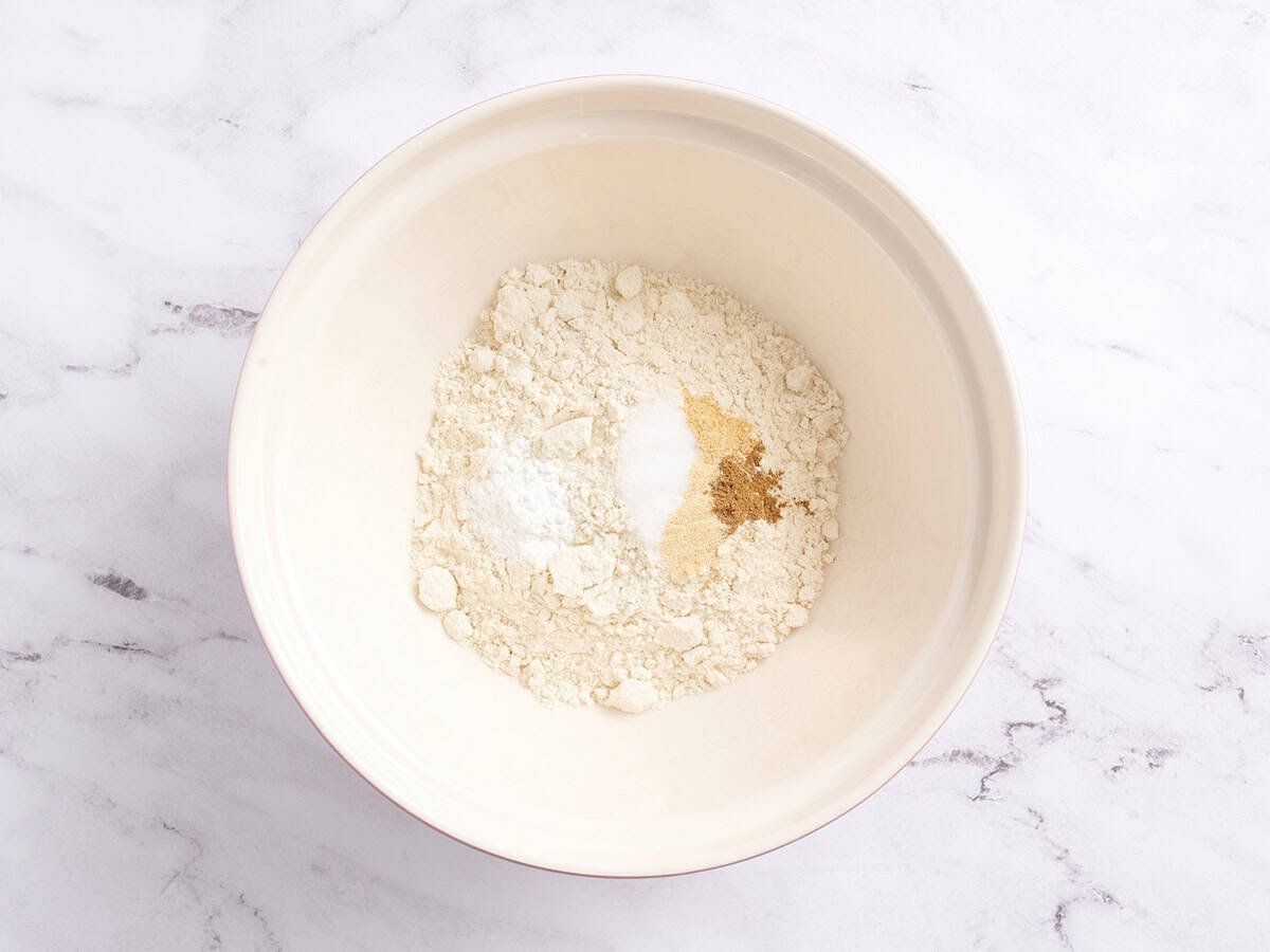 Dry ingredients added to a bowl.