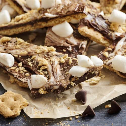 S'mores bark on a piece of parchment paper.