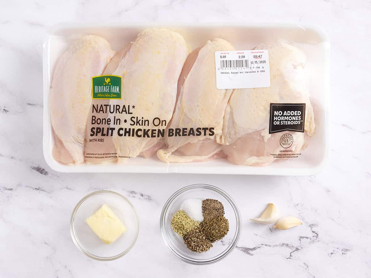 The ingredients to make herb roasted chicken breasts.